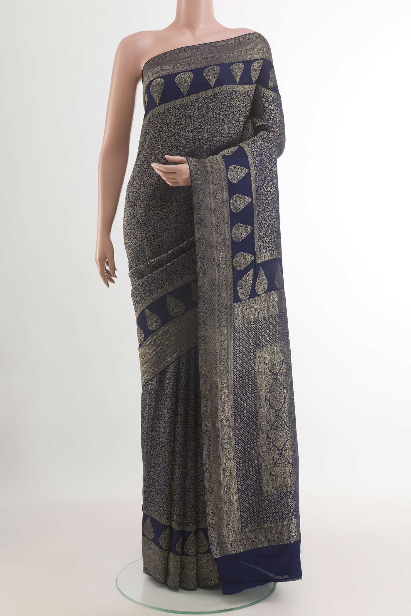 Blue Mysore Crepe Saree with Zari Brocade on the body and Zari Border.  displayed on a mannequin