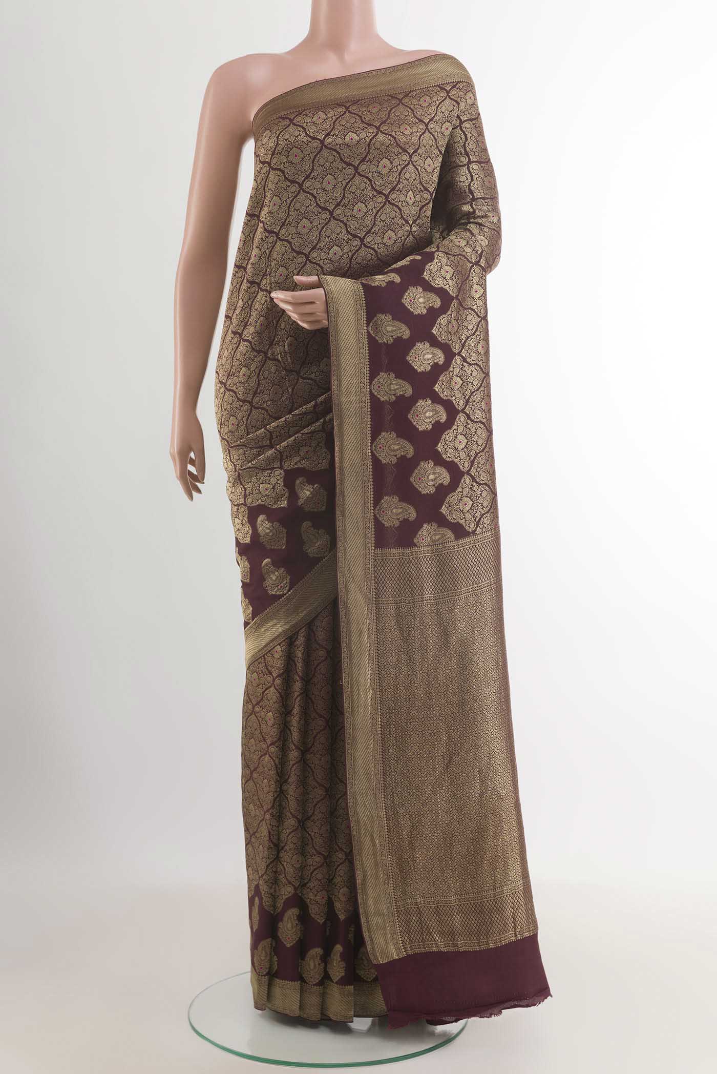 Magenta Mysore Crepe Saree with Zari Brocade on the body and Zari Border.  displayed on a mannequin