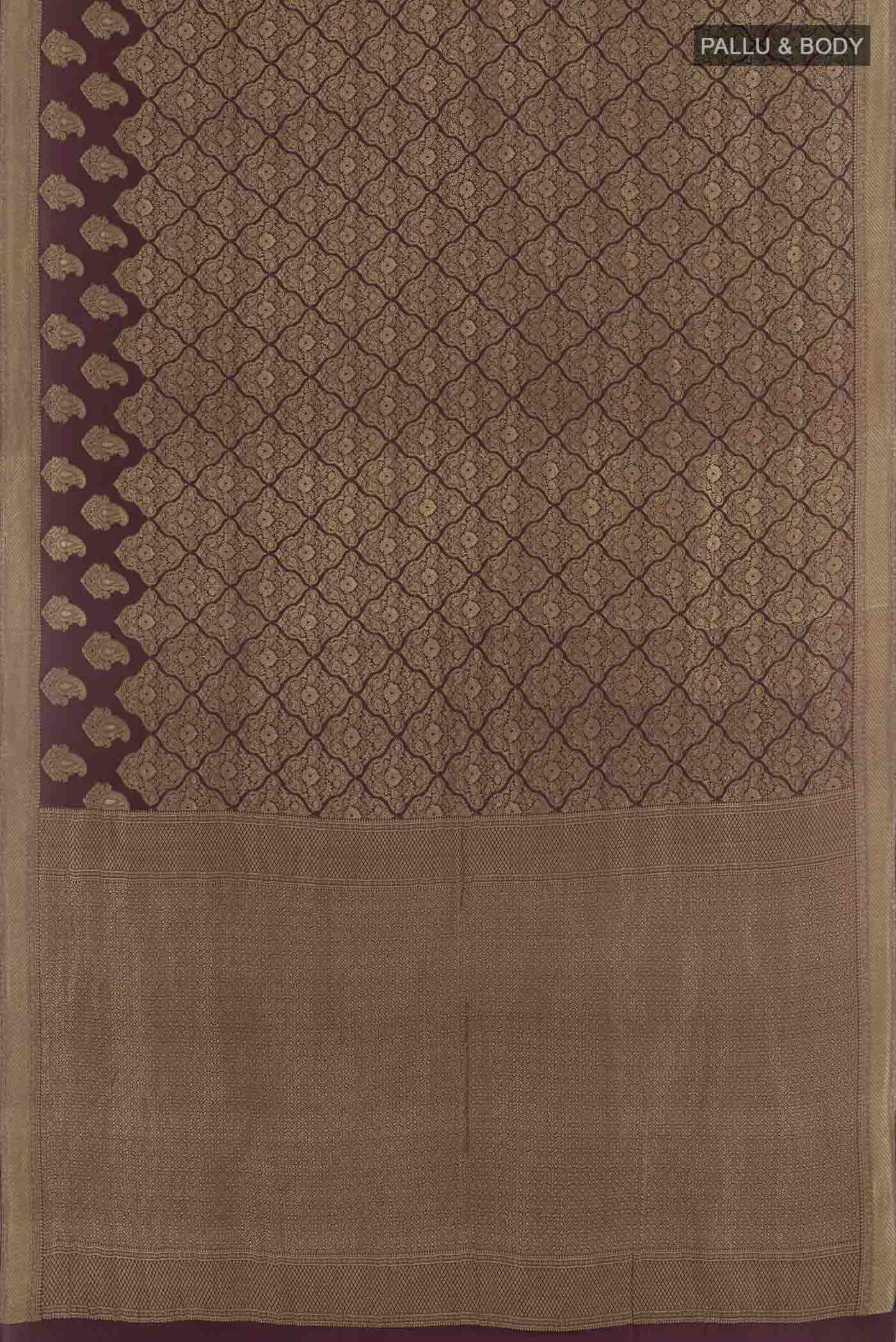 Flat view of Magenta Mysore Crepe Saree with Zari Brocade on the body and Zari Border. 