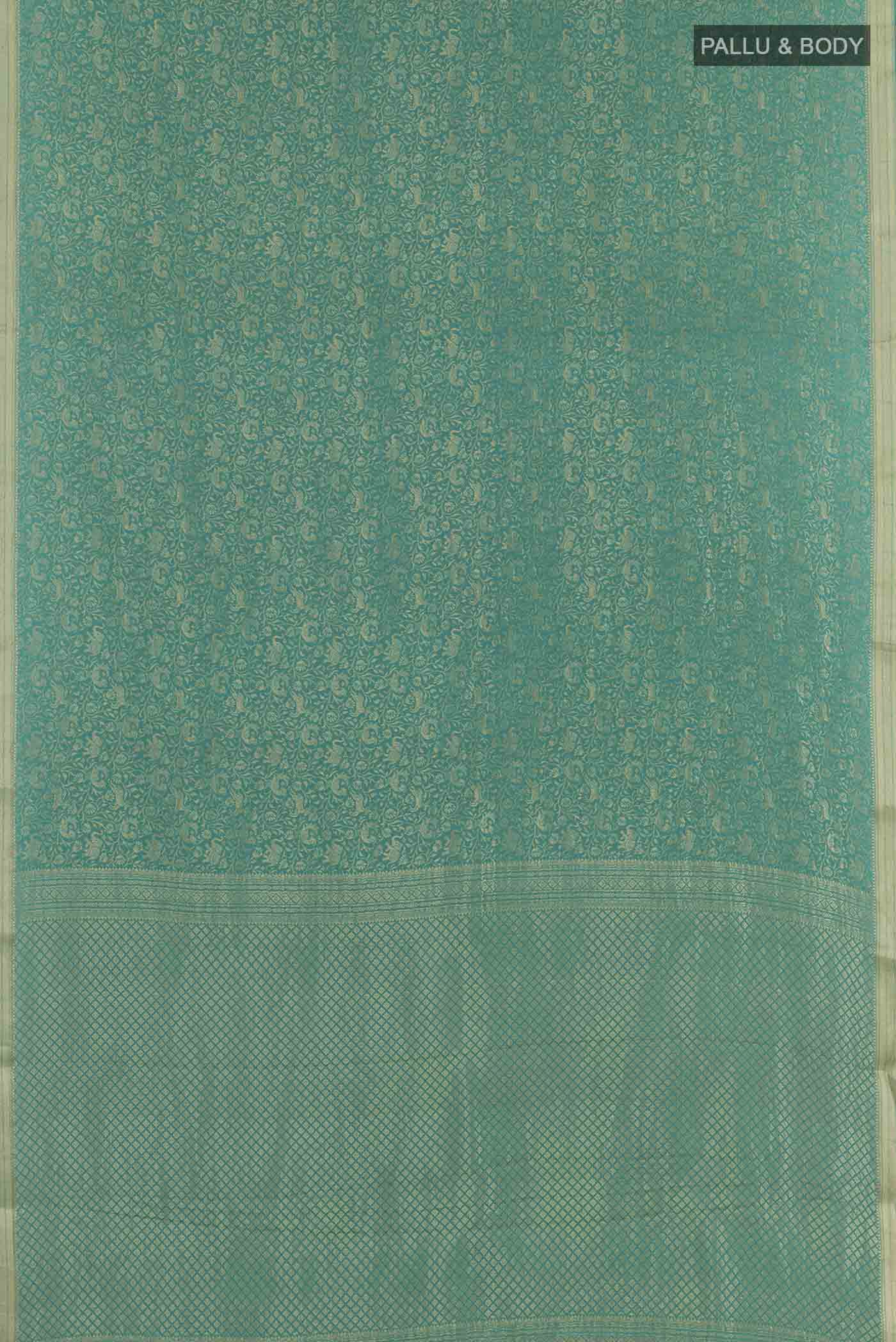 Flat view of Blue Mysore Crepe Saree with Zari Brocade on the body and Zari Border. 