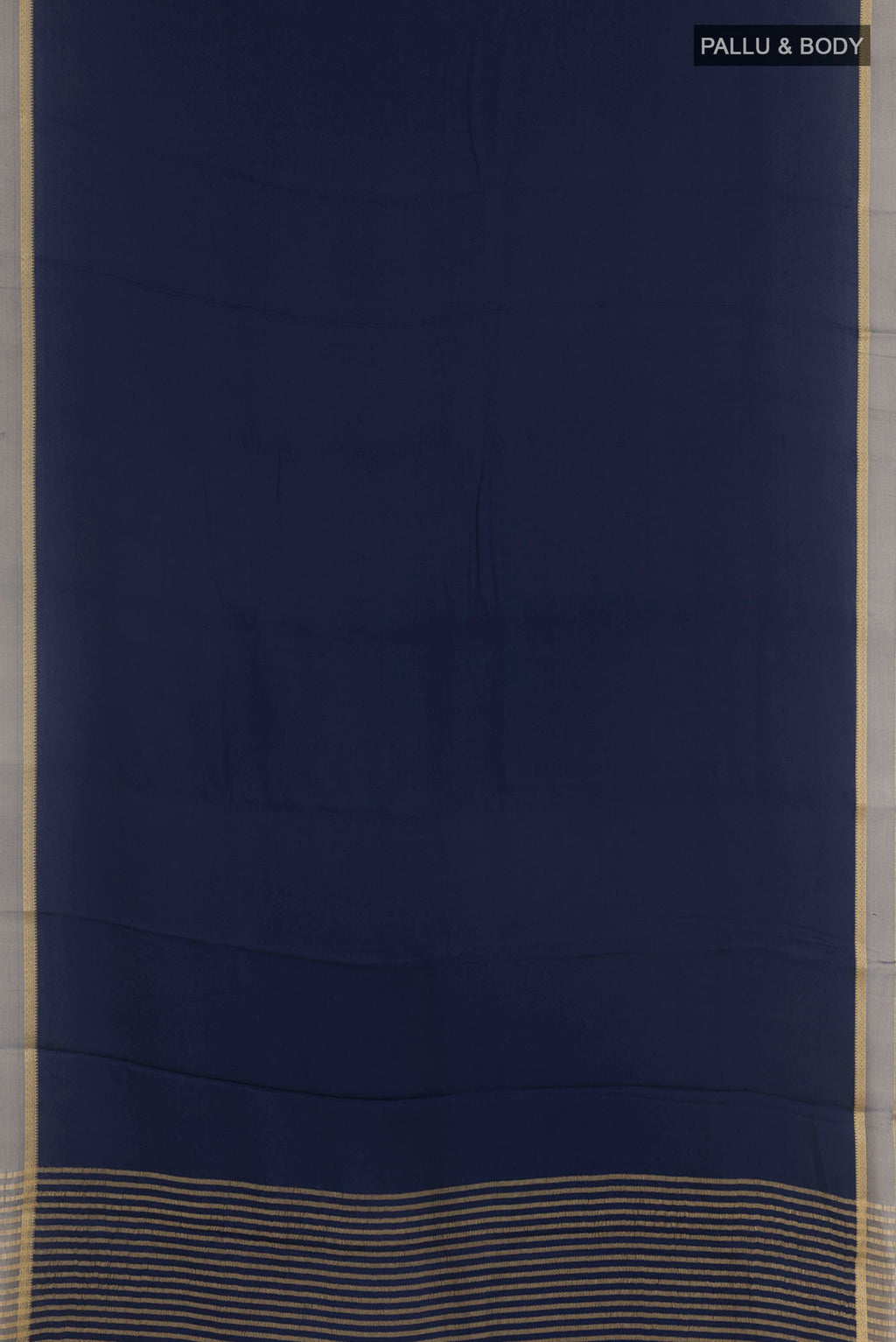 Flat view of Blue Mysore Crepe Saree with Plain Body and Zari Border. 