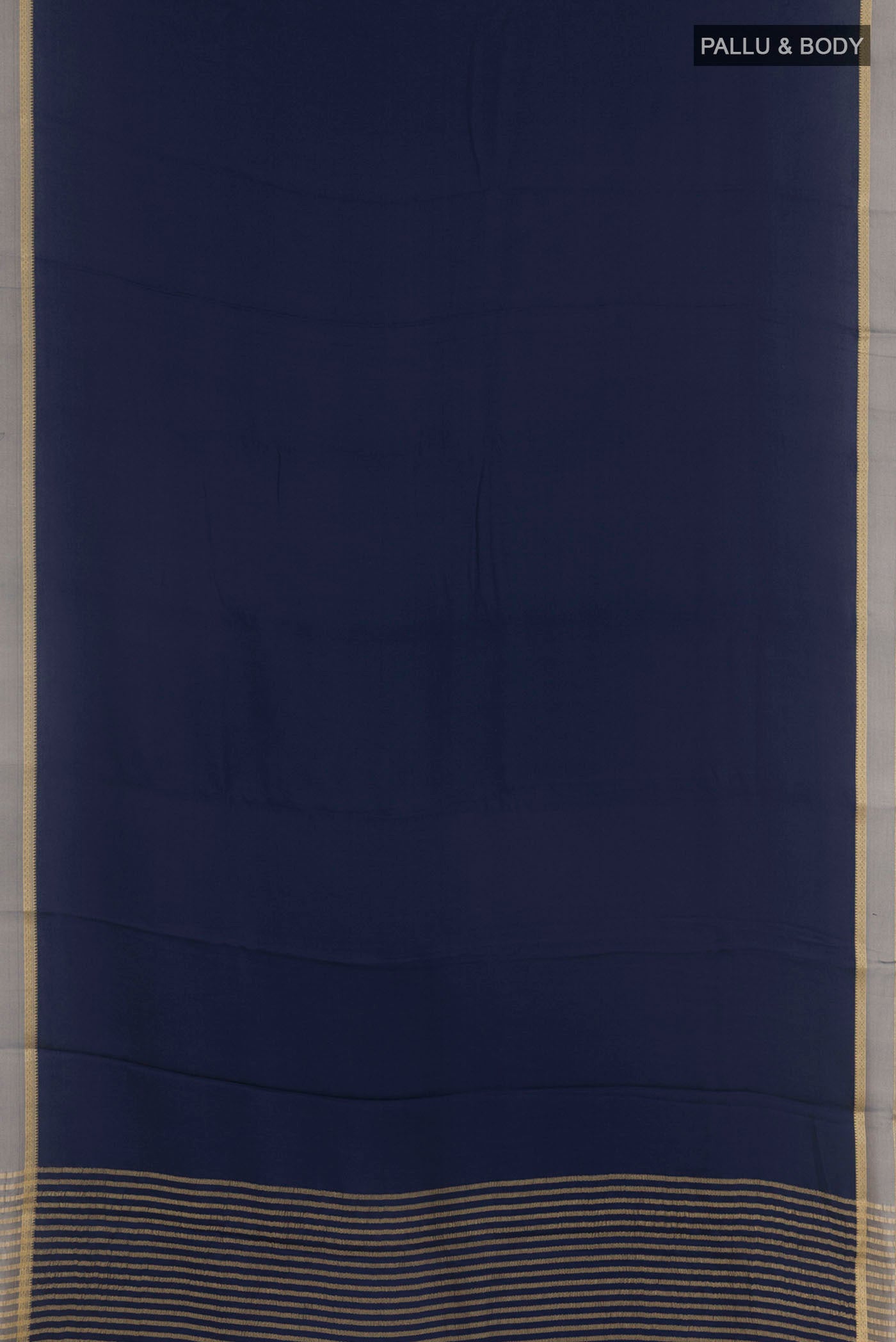 Flat view of Blue Mysore Crepe Saree with Plain Body and Zari Border. 