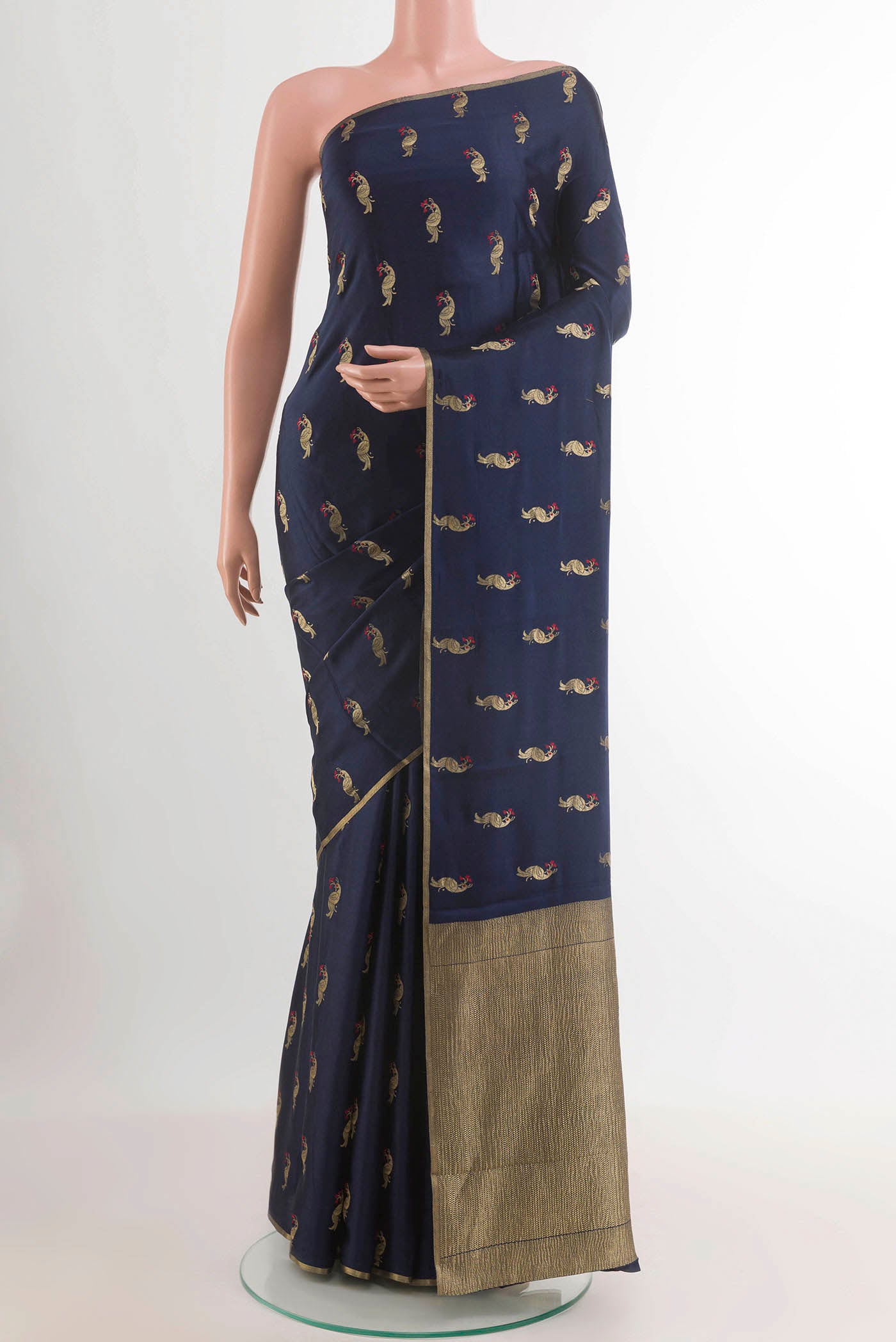 Blue Mysore Crepe Saree with Zari Brocade on the body and Zari Border.  displayed on a mannequin