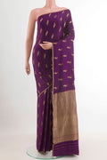 Purple Mysore Crepe Saree with Zari Butta on the body and Zari Border.  displayed on a mannequin
