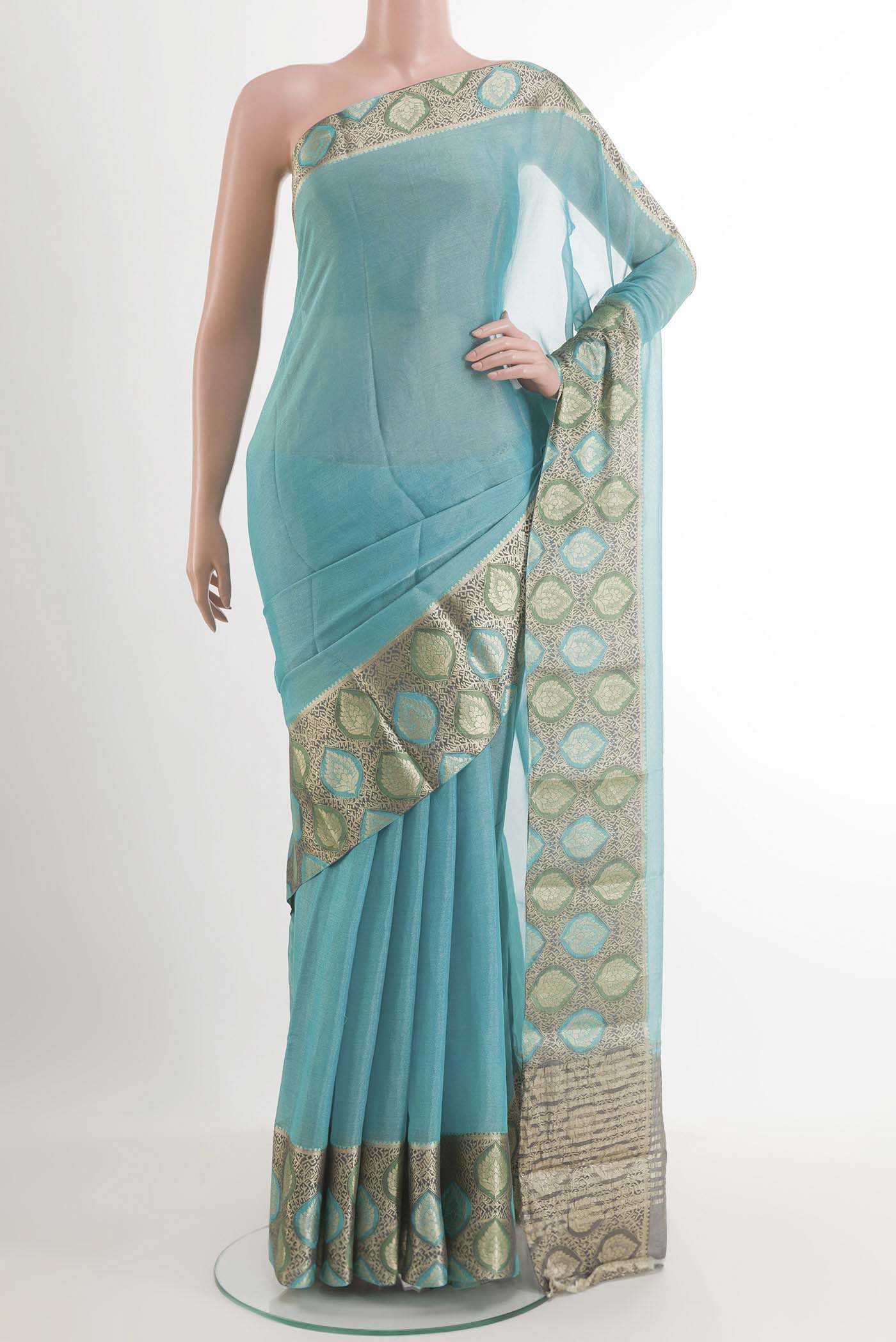 Blue Mysore Georgette Saree with Plain Body and Zari Border.  displayed on a mannequin