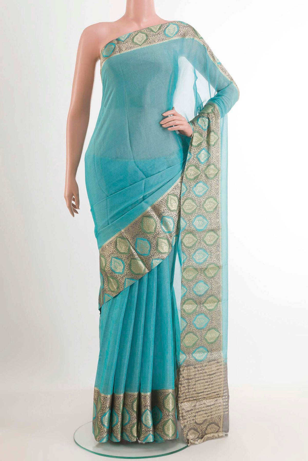 Blue Mysore Georgette Saree with Plain Body and Zari Border.  displayed on a mannequin