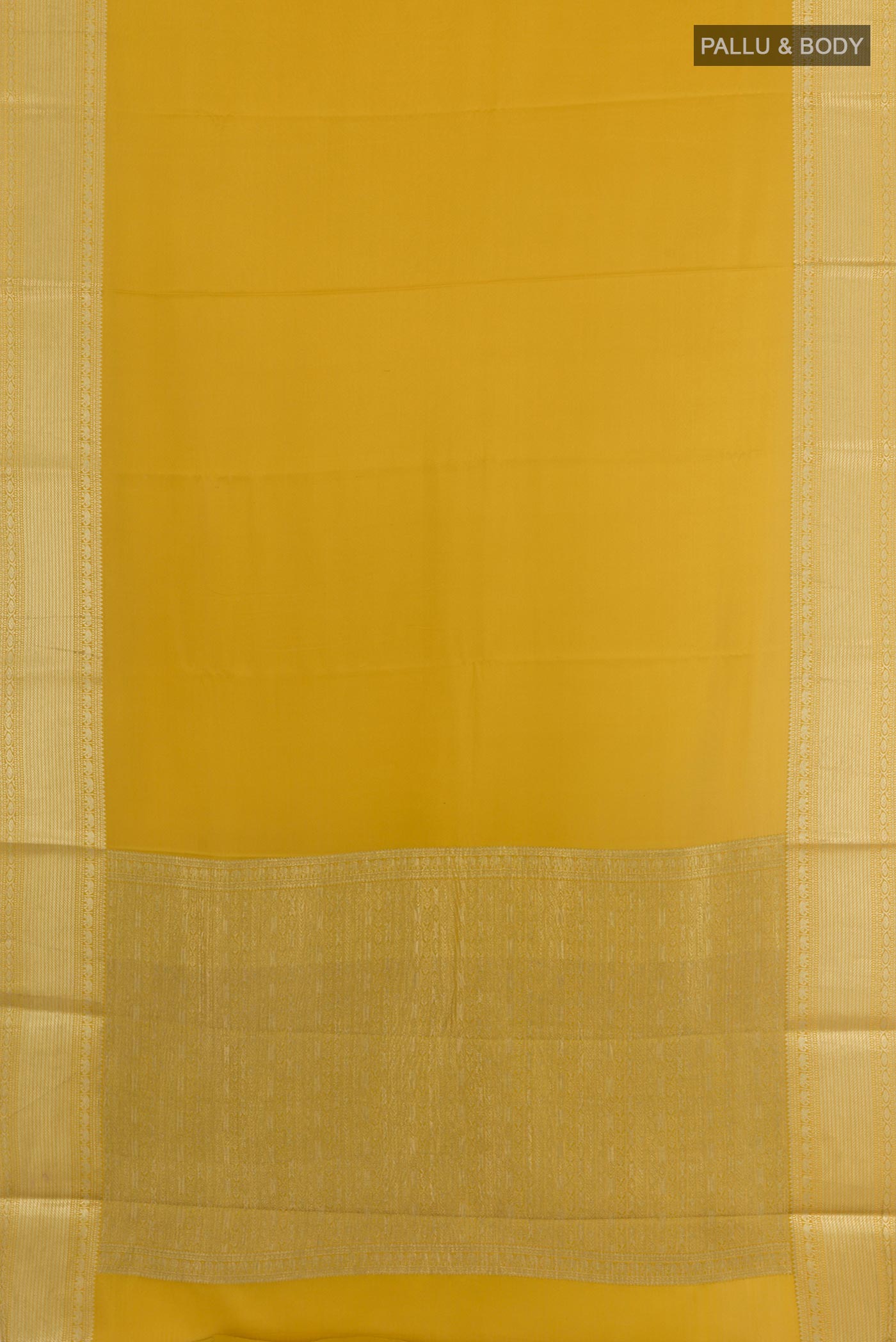 Flat view of Yellow Mysore Crepe Saree with Plain Body and Zari Border. 
