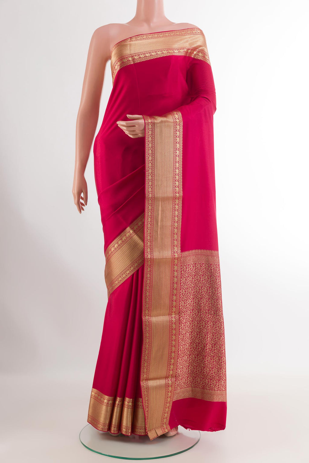 Pink Mysore Crepe Saree with Plain Body and Zari Border.  displayed on a mannequin