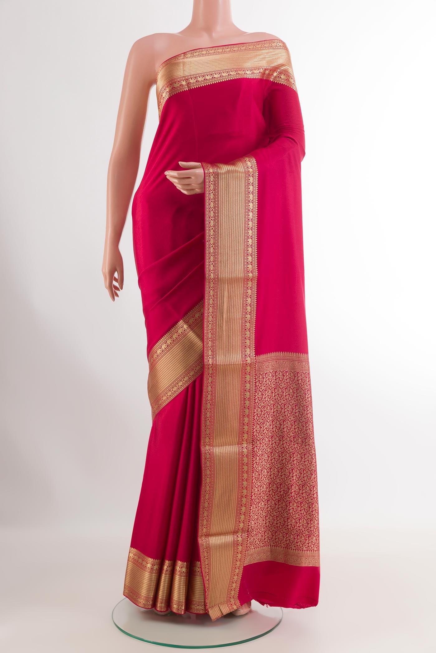 Pink Mysore Crepe Saree with Plain Body and Zari Border.  displayed on a mannequin