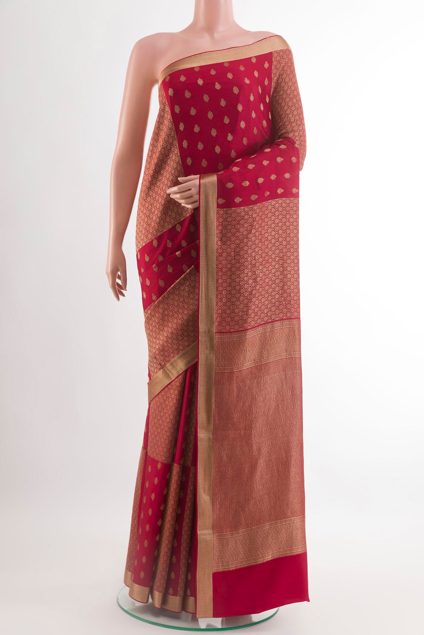 Red Mysore Crepe Saree with Zari Butta on the body and Plain Border.  displayed on a mannequin