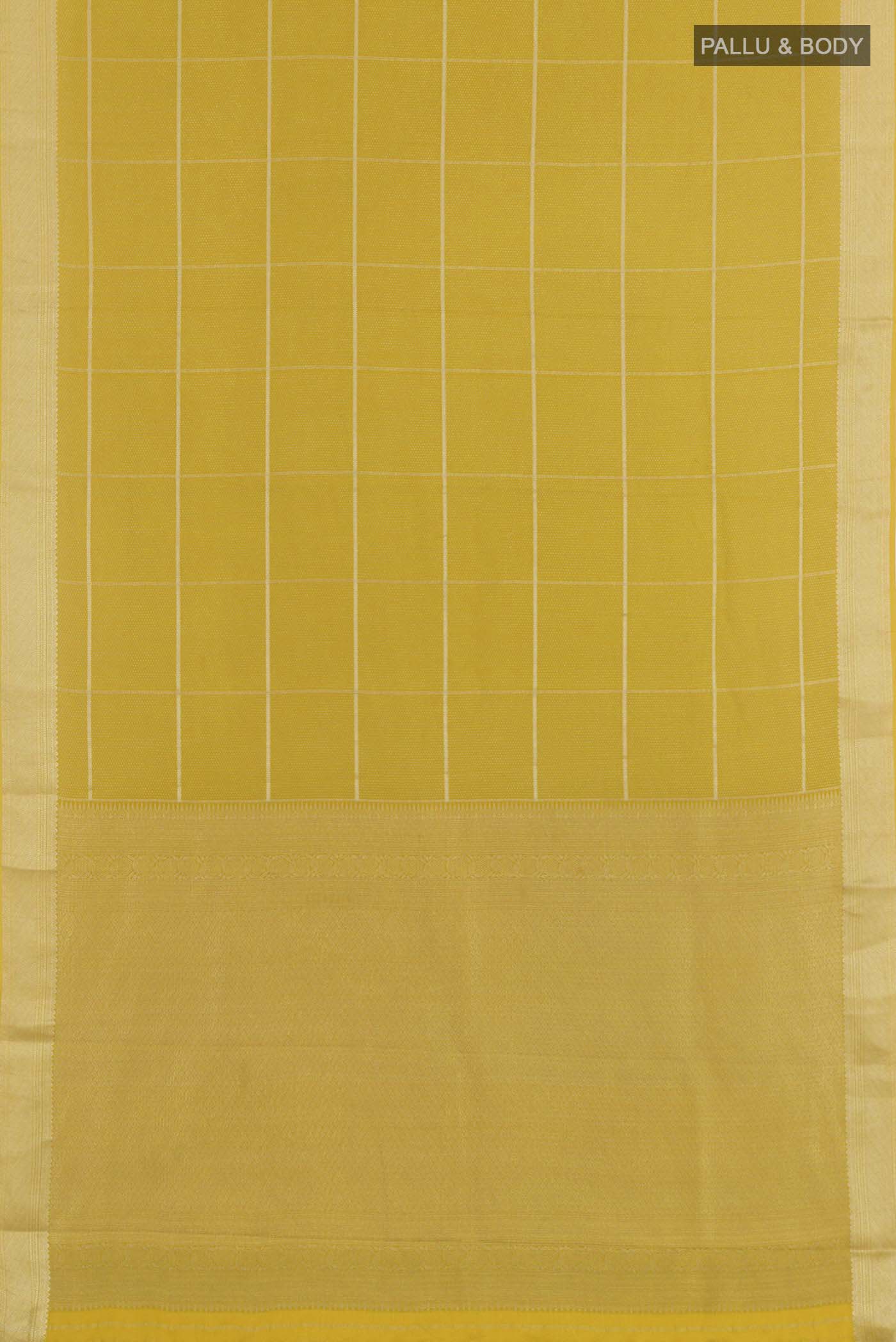Flat view of Yellow Mysore Crepe Saree with Zari Brocade on the body and Zari Border. 