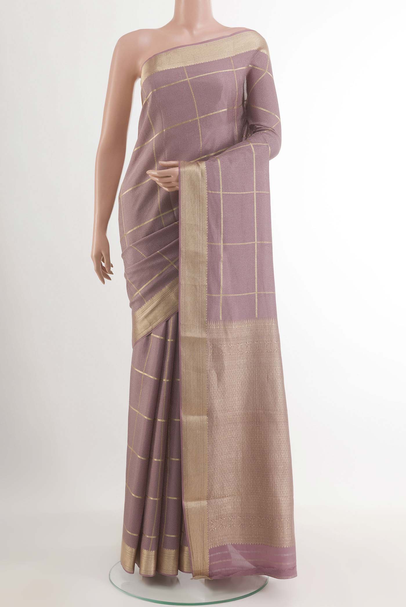 Lavender Mysore Crepe Saree with Zari Brocade on the body and Zari Border.  displayed on a mannequin