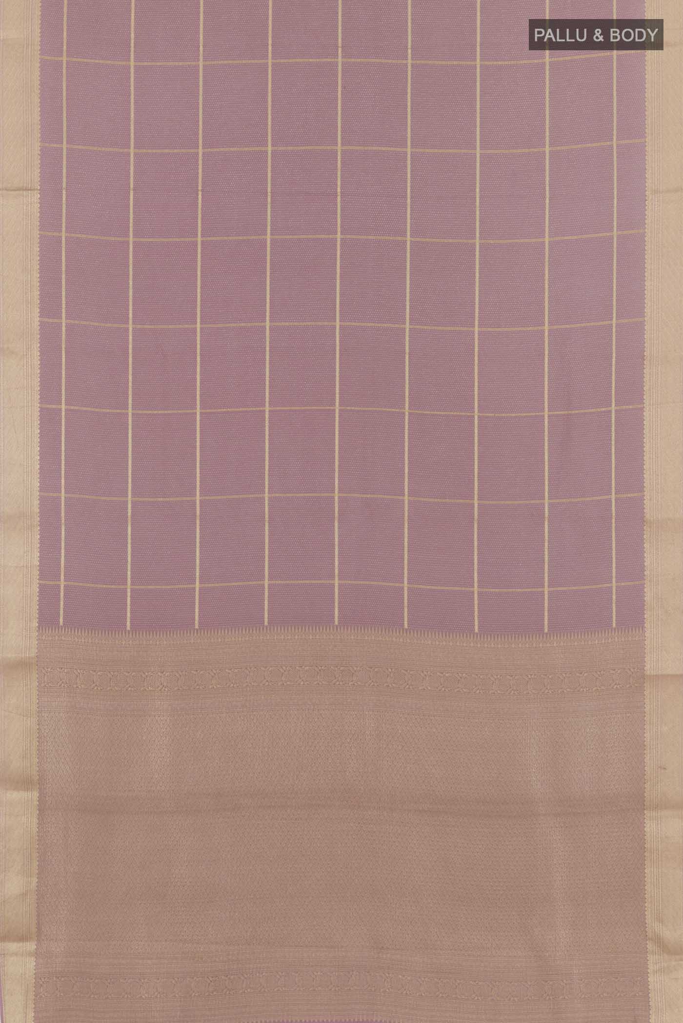 Flat view of Lavender Mysore Crepe Saree with Zari Brocade on the body and Zari Border. 
