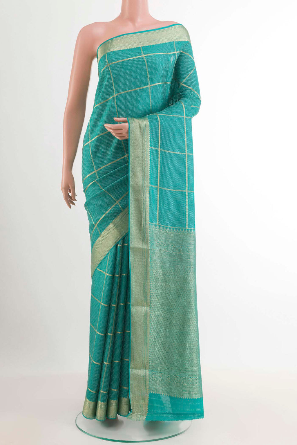 Blue Mysore Crepe Saree with Zari Brocade on the body and Zari Border.  displayed on a mannequin