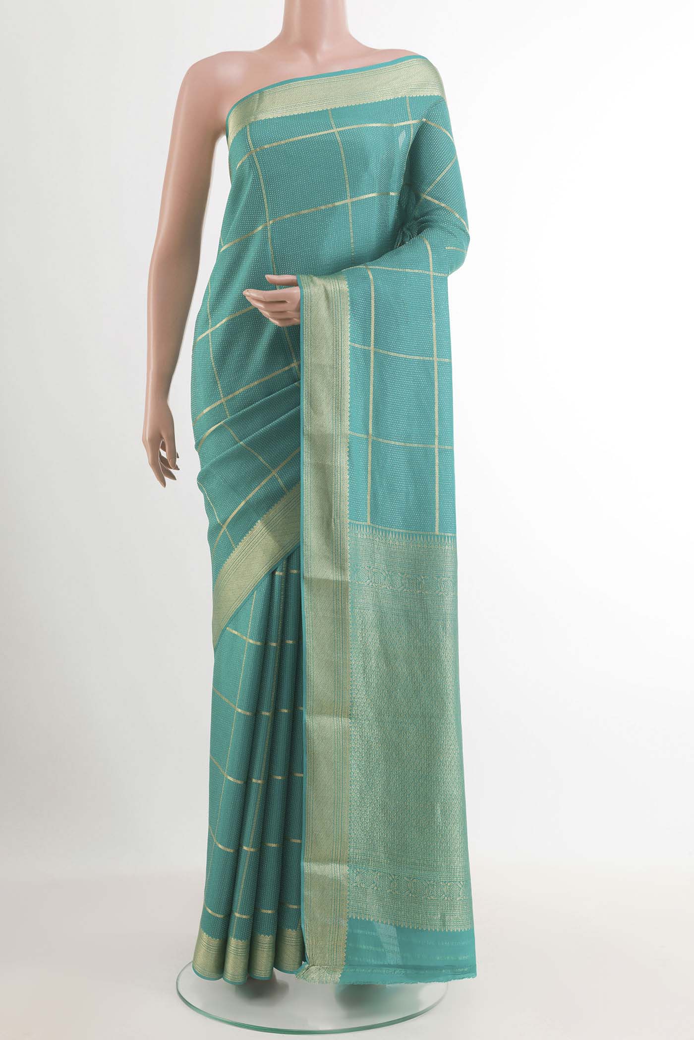 Blue Mysore Crepe Saree with Zari Brocade on the body and Zari Border.  displayed on a mannequin