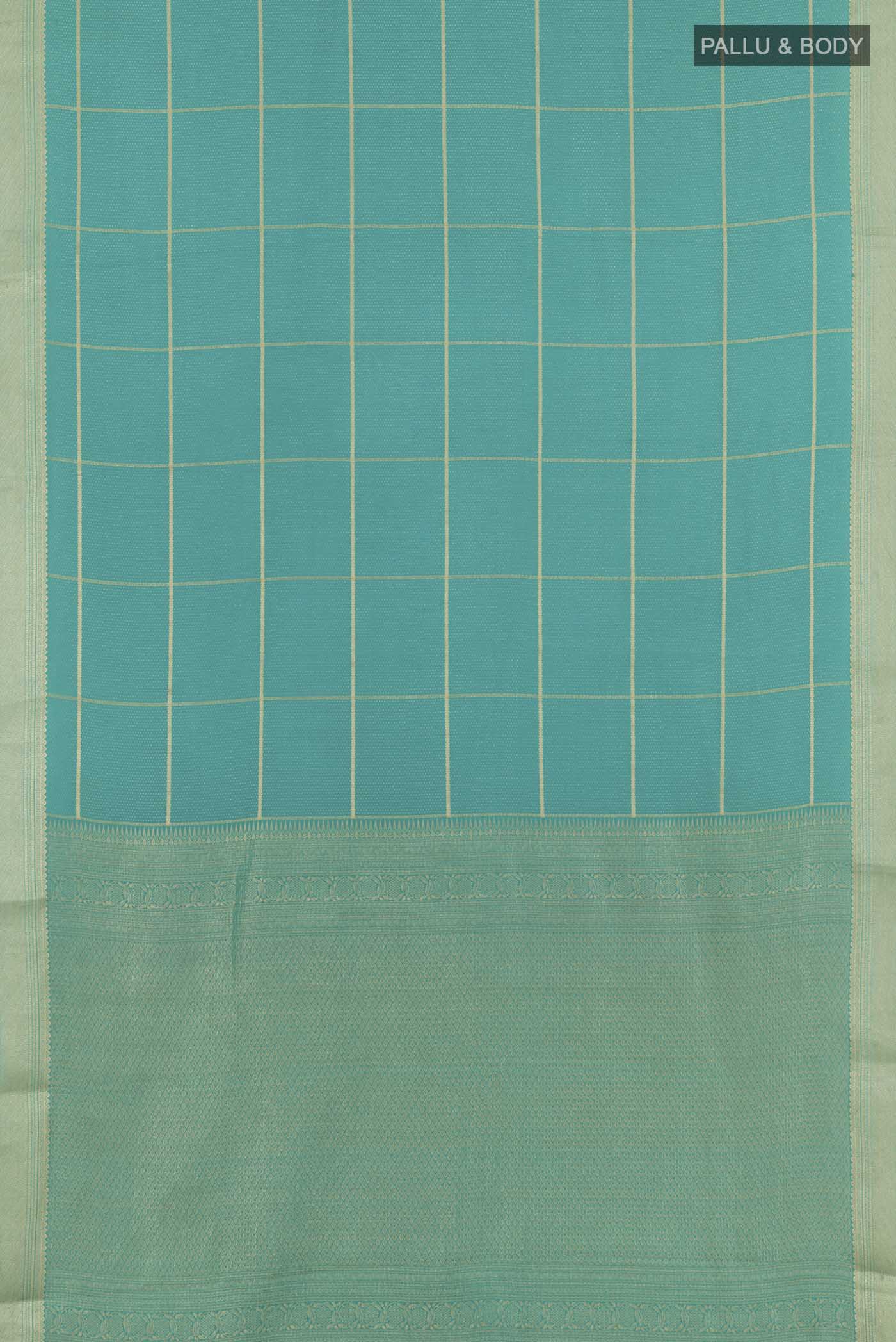Flat view of Blue Mysore Crepe Saree with Zari Brocade on the body and Zari Border. 