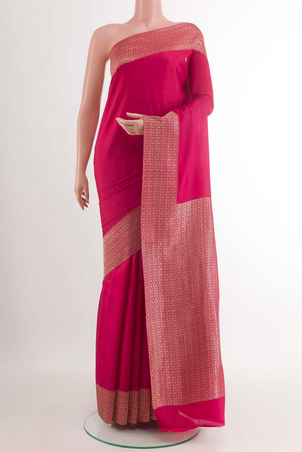 Pink Mysore Crepe Saree with Plain Body and Zari Border.  displayed on a mannequin