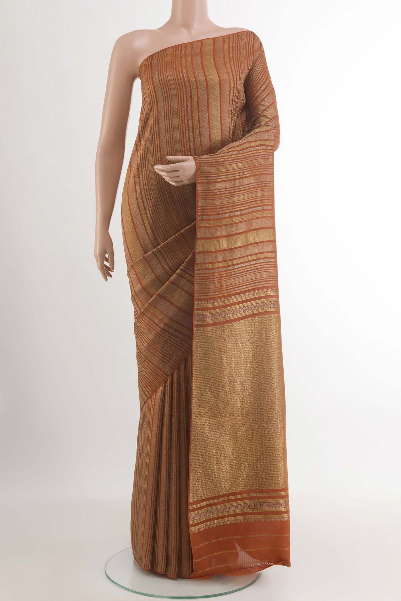 Orange Mysore Crepe Saree with Stripes on the body and Zari Border.  displayed on a mannequin