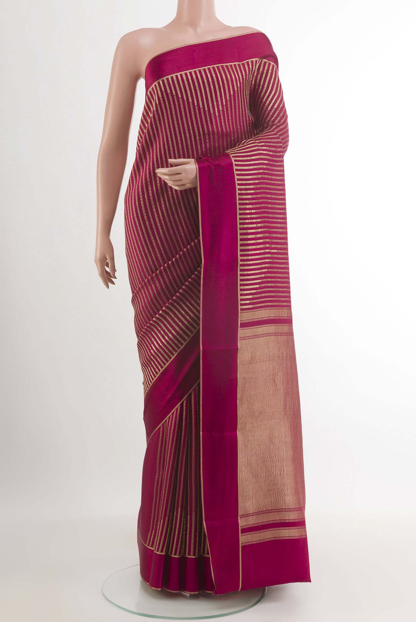 Pink Mysore Crepe Saree with Stripes on the body and Zari Border.  displayed on a mannequin