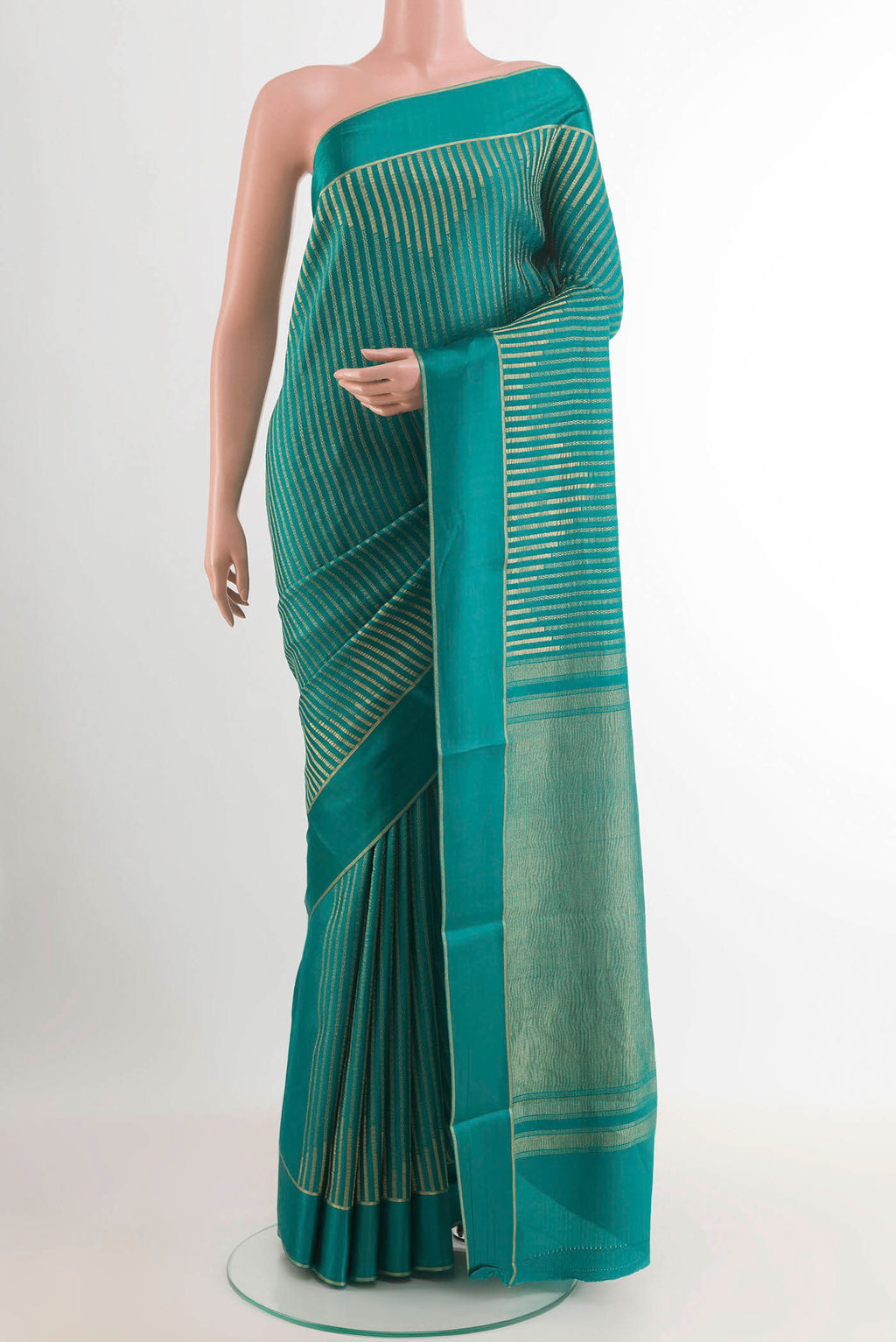 Sea Green Mysore Crepe Saree with Stripes on the body and Zari Border.  displayed on a mannequin
