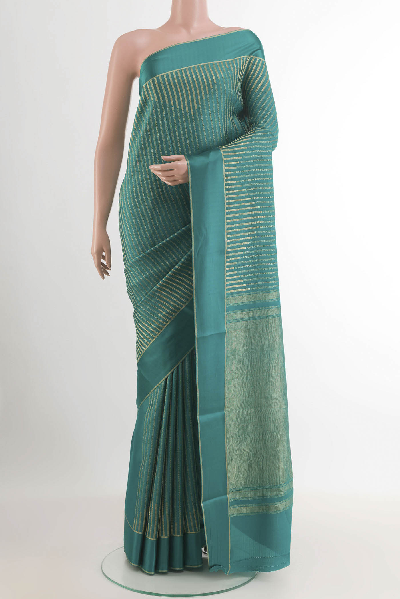 Sea Green Mysore Crepe Saree with Stripes on the body and Zari Border.  displayed on a mannequin