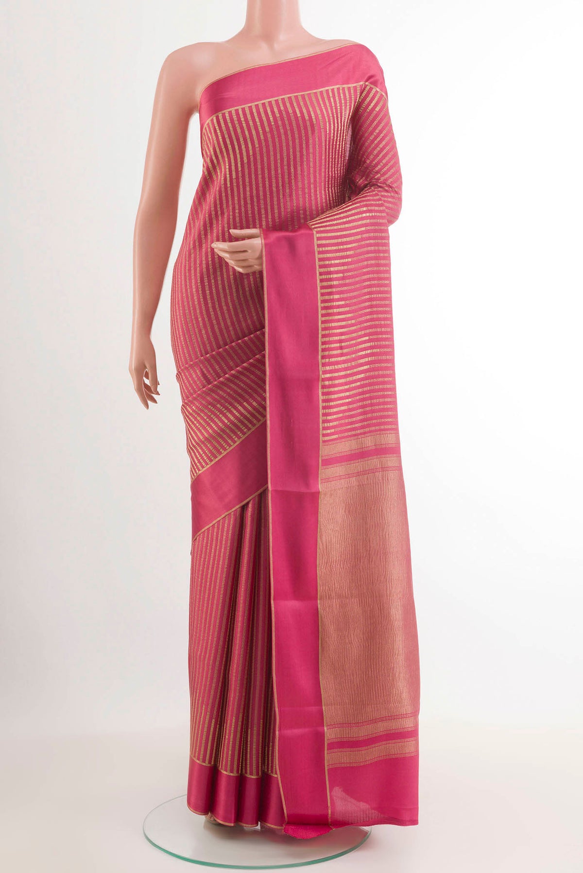 Pink Mysore Crepe Saree with Stripes on the body and Zari Border.  displayed on a mannequin