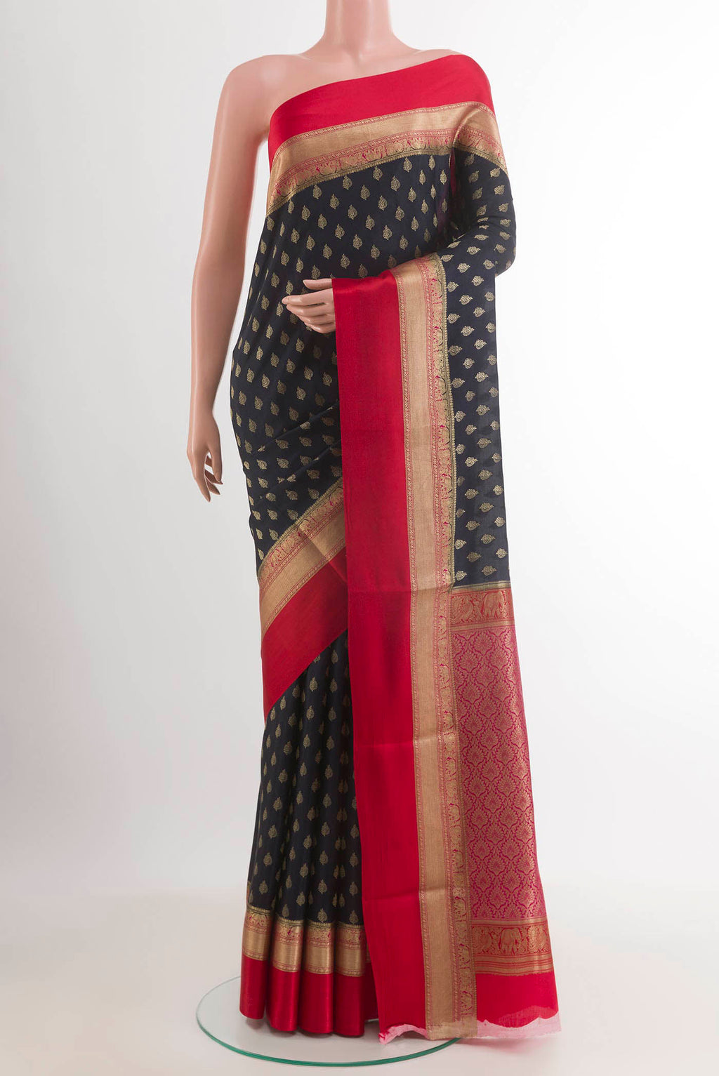 Dark Blue Mysore Crepe Saree with Zari Butta on the body and Zari Border.  displayed on a mannequin