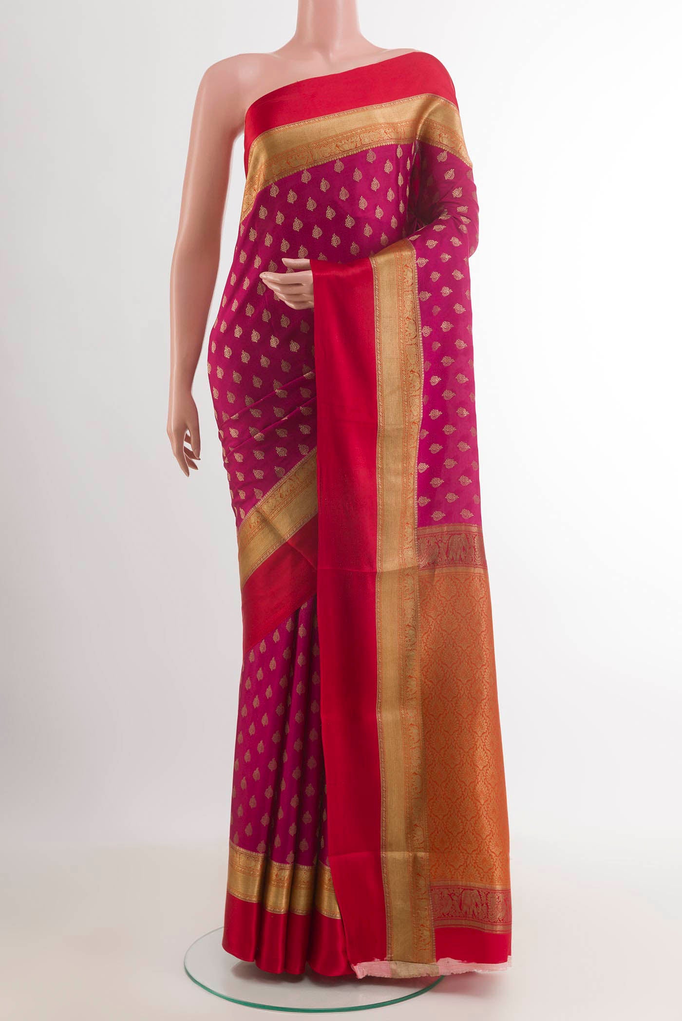 Pink Mysore Crepe Saree with Zari Butta on the body and Zari Border.  displayed on a mannequin