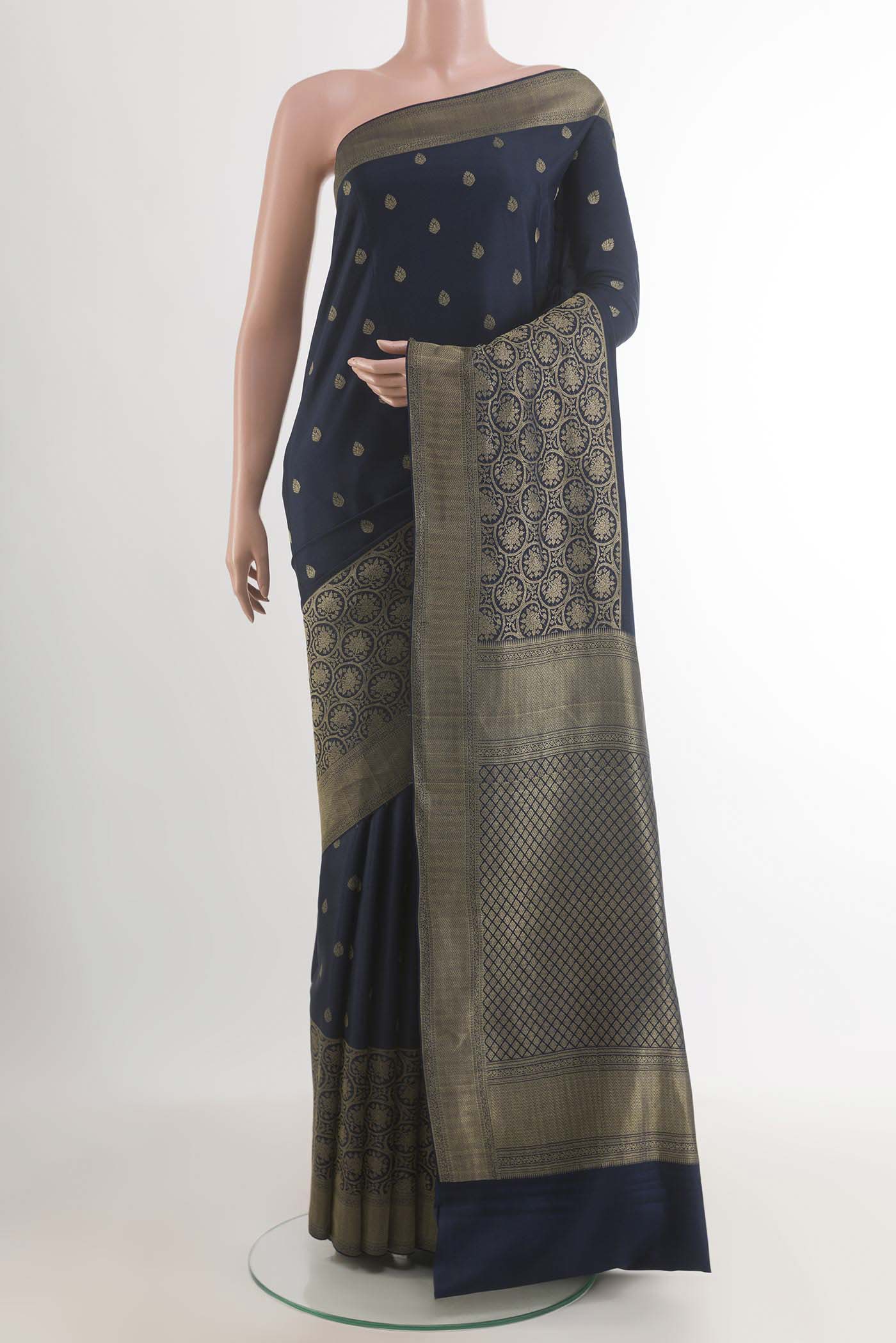 Dark Blue Mysore Crepe Saree with Zari Butta on the body and Zari Border.  displayed on a mannequin