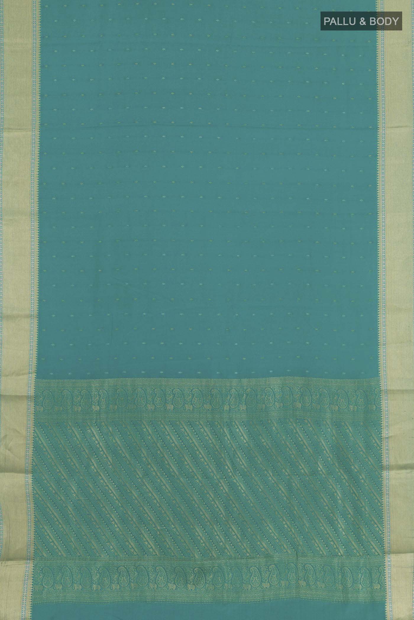 Flat view of Sea Green Mysore Crepe Saree with Zari Butta on the body and Zari Border. 