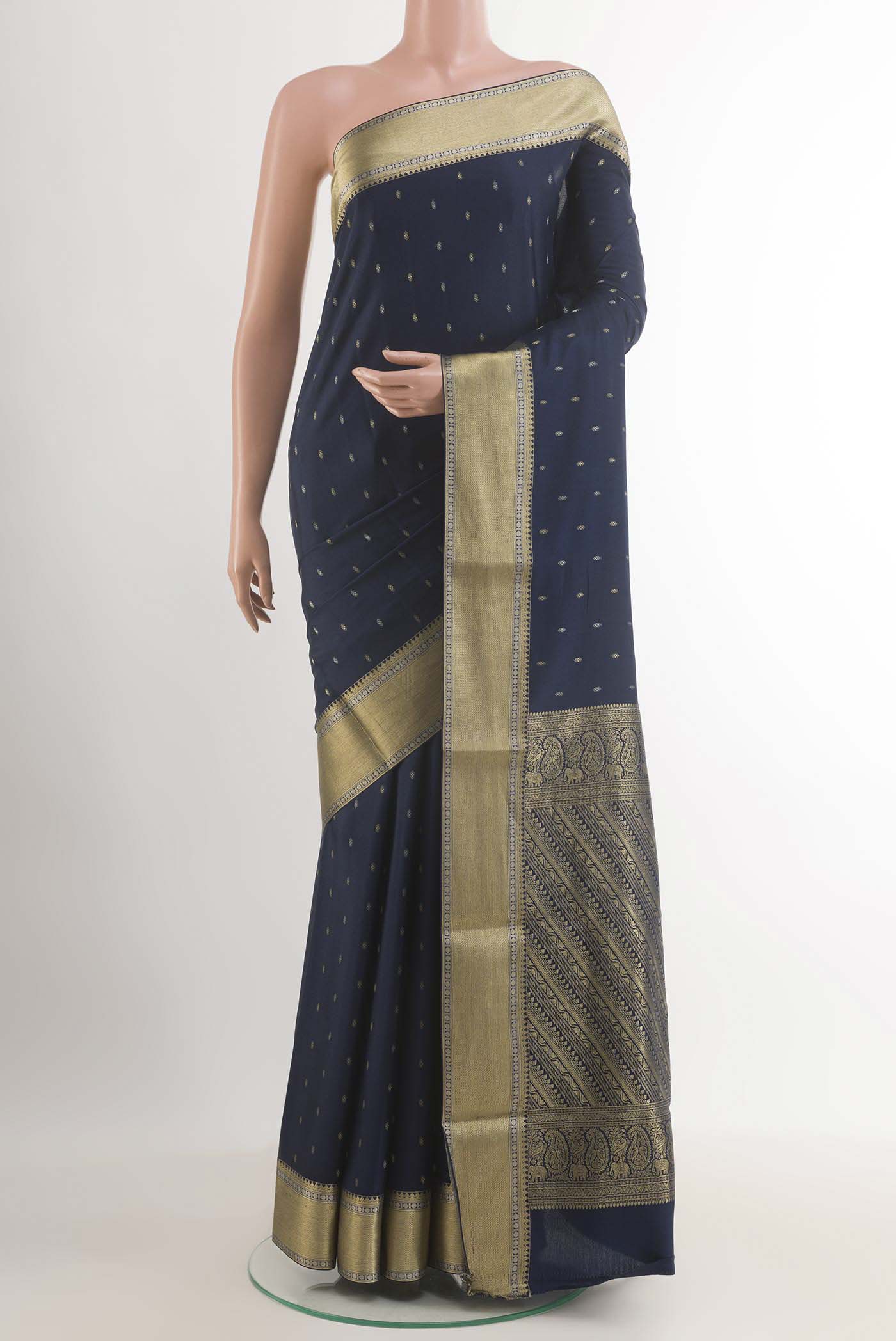 Dark Blue Mysore Crepe Saree with Zari Butta on the body and Zari Border.  displayed on a mannequin