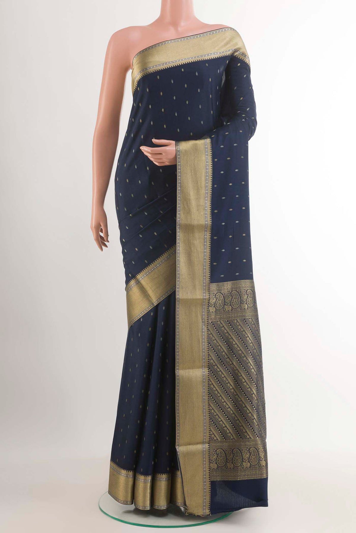 Dark Blue Mysore Crepe Saree with Zari Butta on the body and Zari Border.  displayed on a mannequin