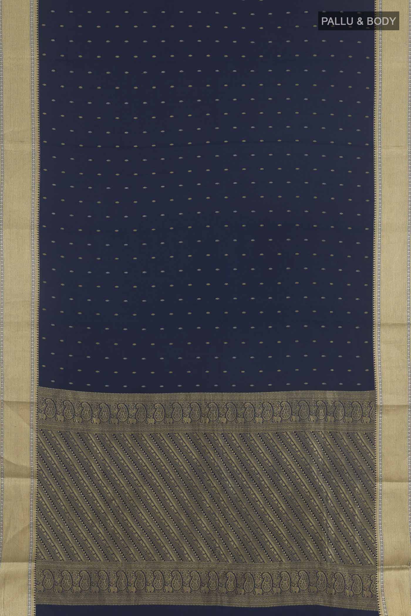 Flat view of Dark Blue Mysore Crepe Saree with Zari Butta on the body and Zari Border. 