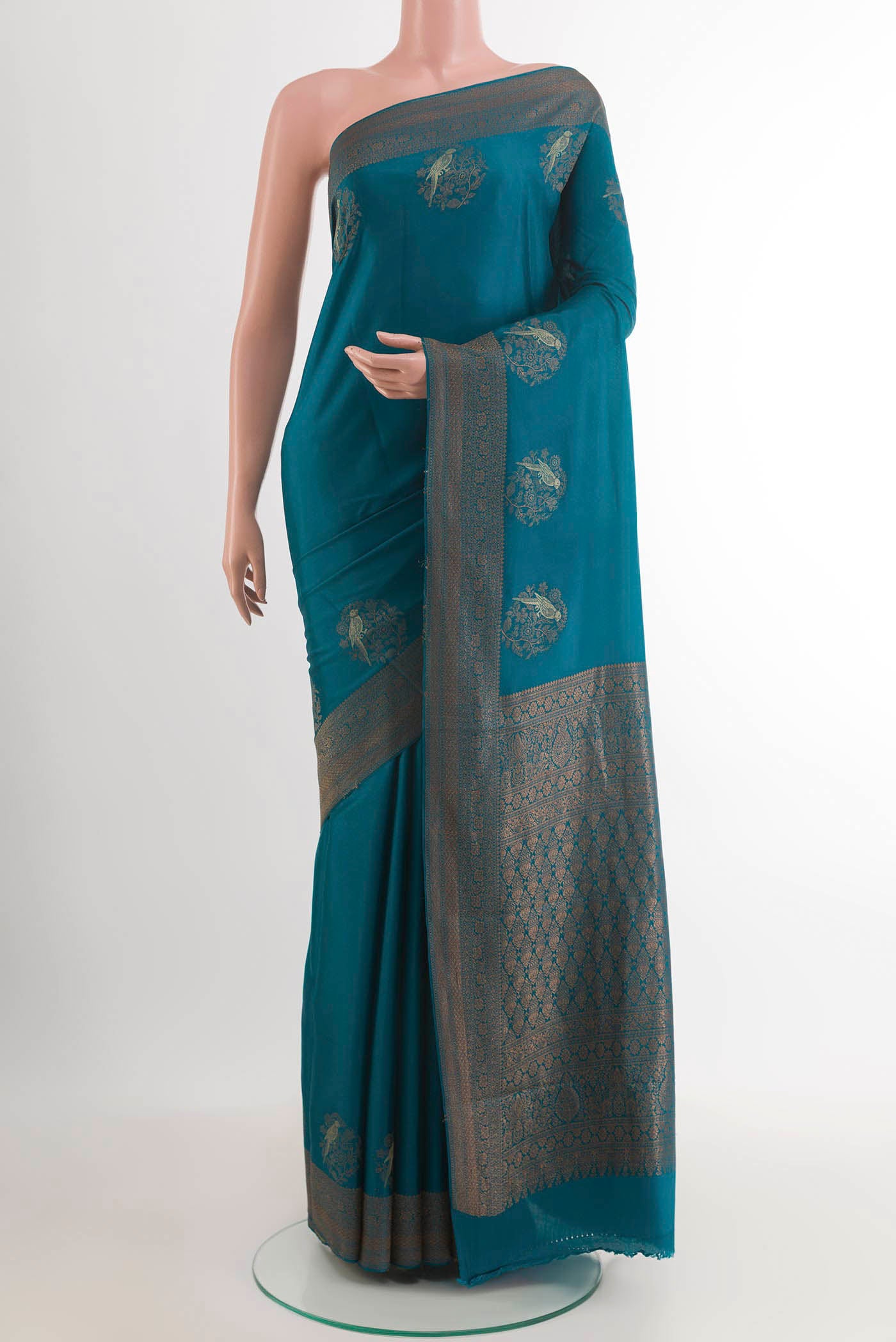 Blue Mysore Crepe Saree with Plain Body and Zari Border.  displayed on a mannequin