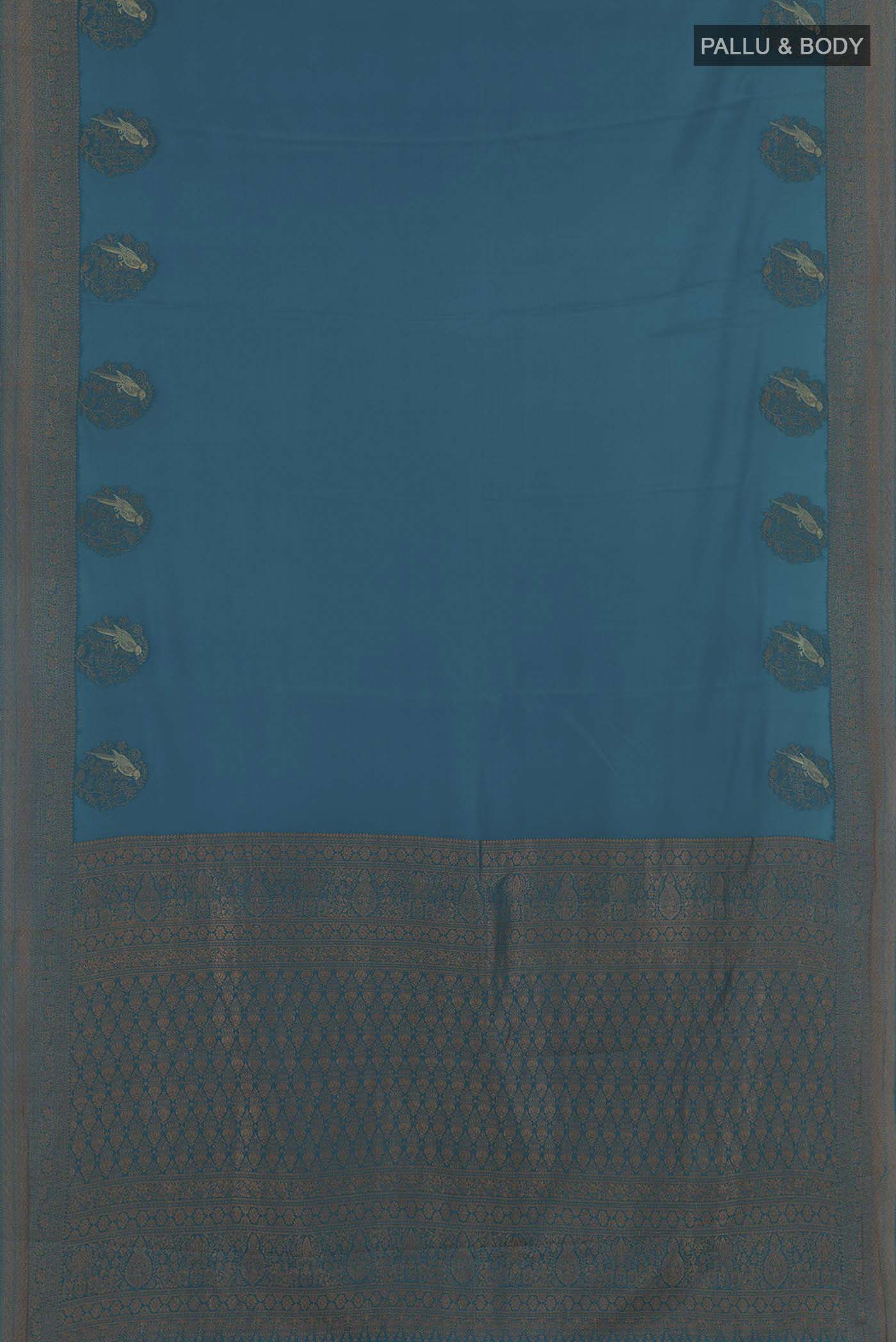 Flat view of Blue Mysore Crepe Saree with Plain Body and Zari Border. 