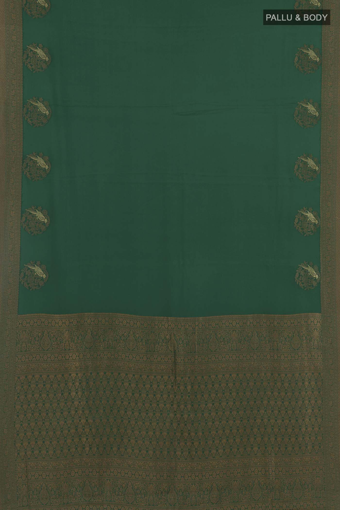Flat view of Green Mysore Crepe Saree with Zari Butta on the body and Zari Border. 