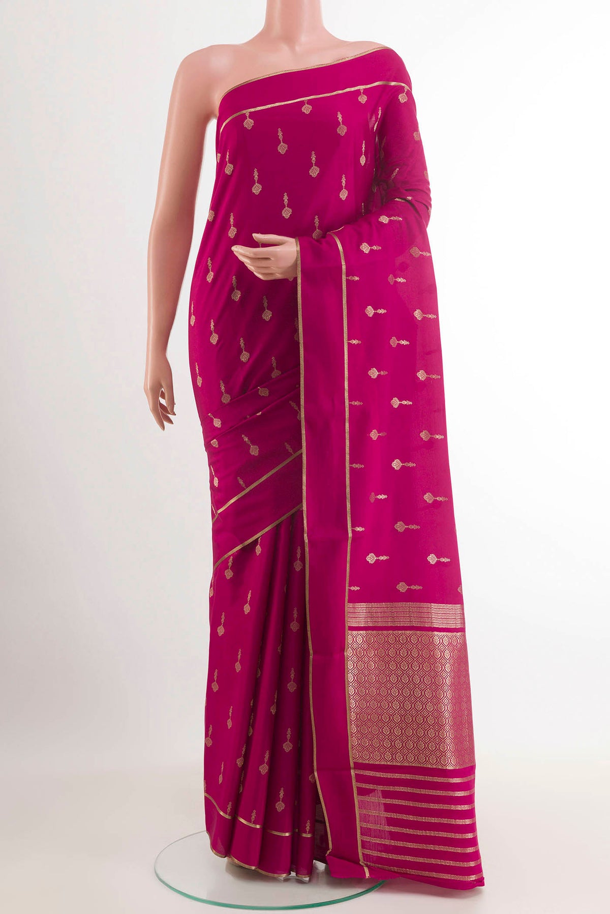 Pink Mysore Crepe Saree with Zari Butta on the body and Zari Border.  displayed on a mannequin