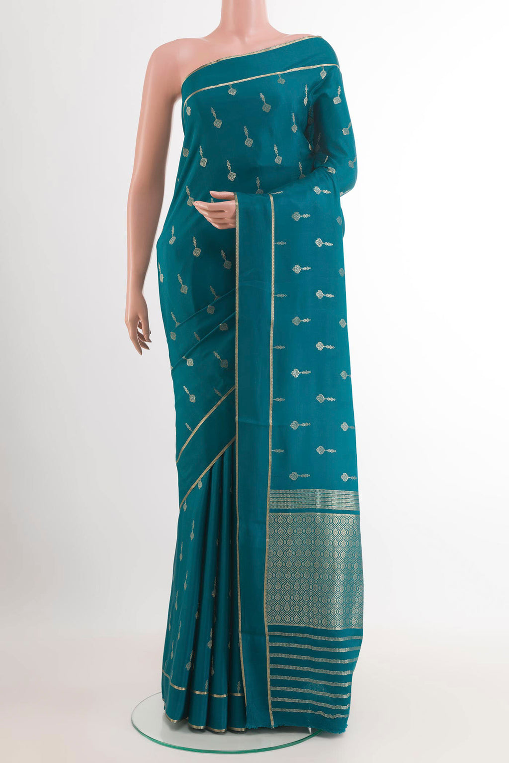 Royal Blue Mysore Crepe Saree with Zari Butta on the body and Zari Border.  displayed on a mannequin