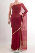 Red Mysore Chiffon Saree with Embroidery on the body and Zari Border.  displayed on a mannequin