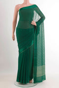 Green Mysore Chiffon Saree with Embroidery on the body and Zari Border.  displayed on a mannequin