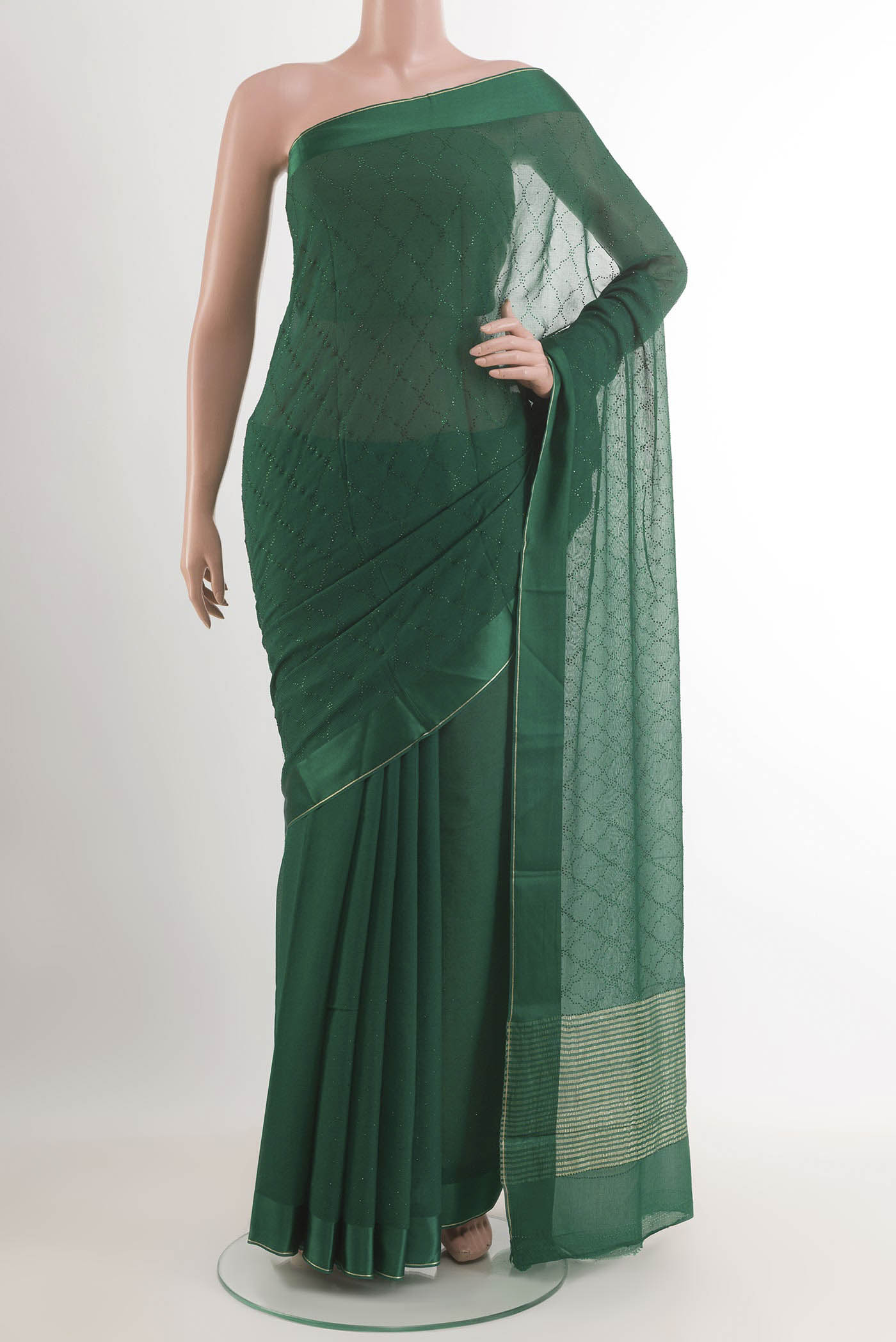 Green Mysore Chiffon Saree with Embroidery on the body and Zari Border.  displayed on a mannequin