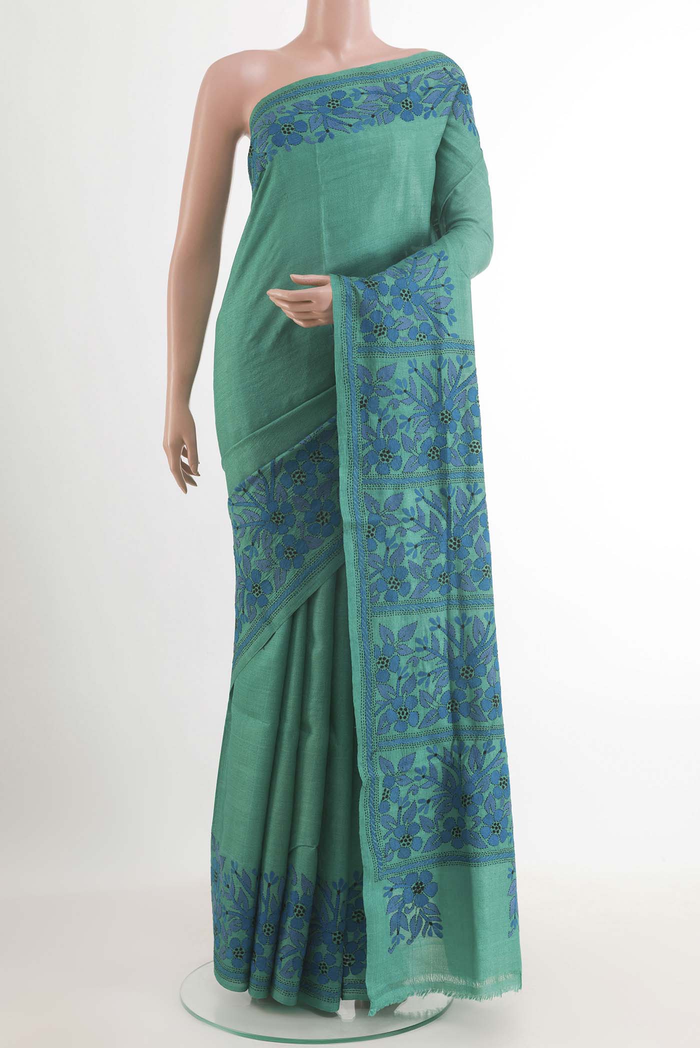 Blue Tussar Saree with Kantha Work on the body and Embroidery Border.  displayed on a mannequin