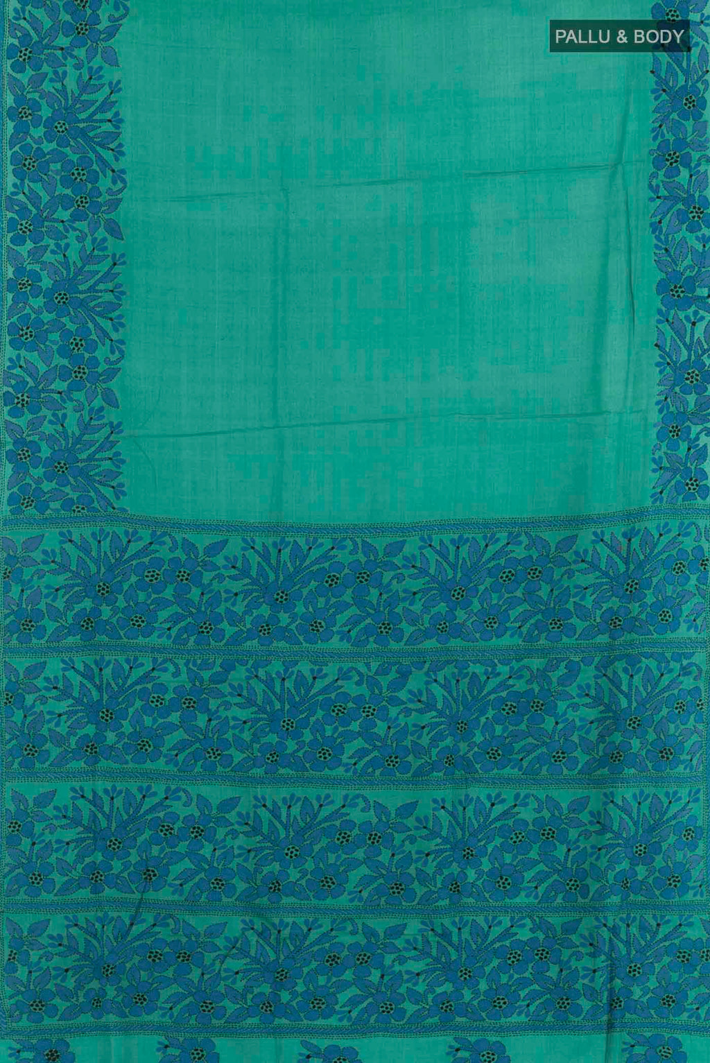 Flat view of Blue Tussar Saree with Kantha Work on the body and Embroidery Border. 