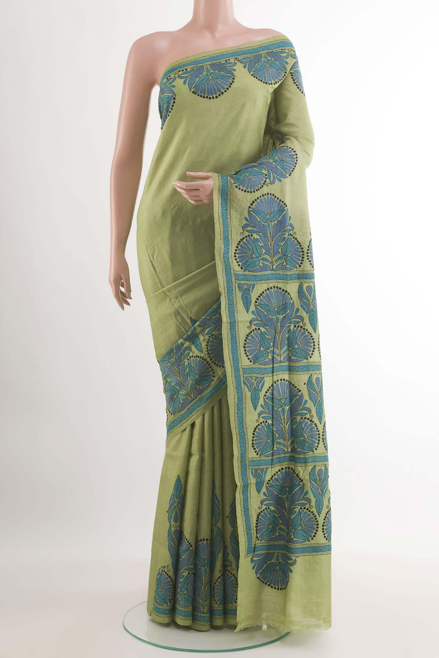 Green Tussar Saree with Kantha Work on the body and Embroidery Border.  displayed on a mannequin