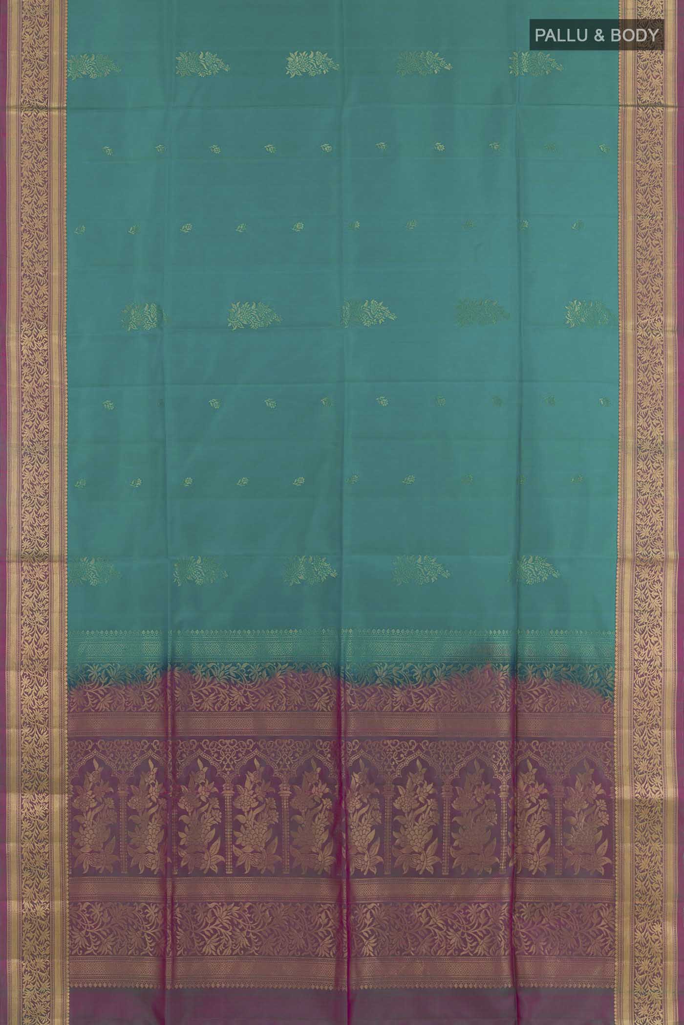 Flat view of Sea Green Soft Silk Saree with Zari Butta on the body and Zari Border. 