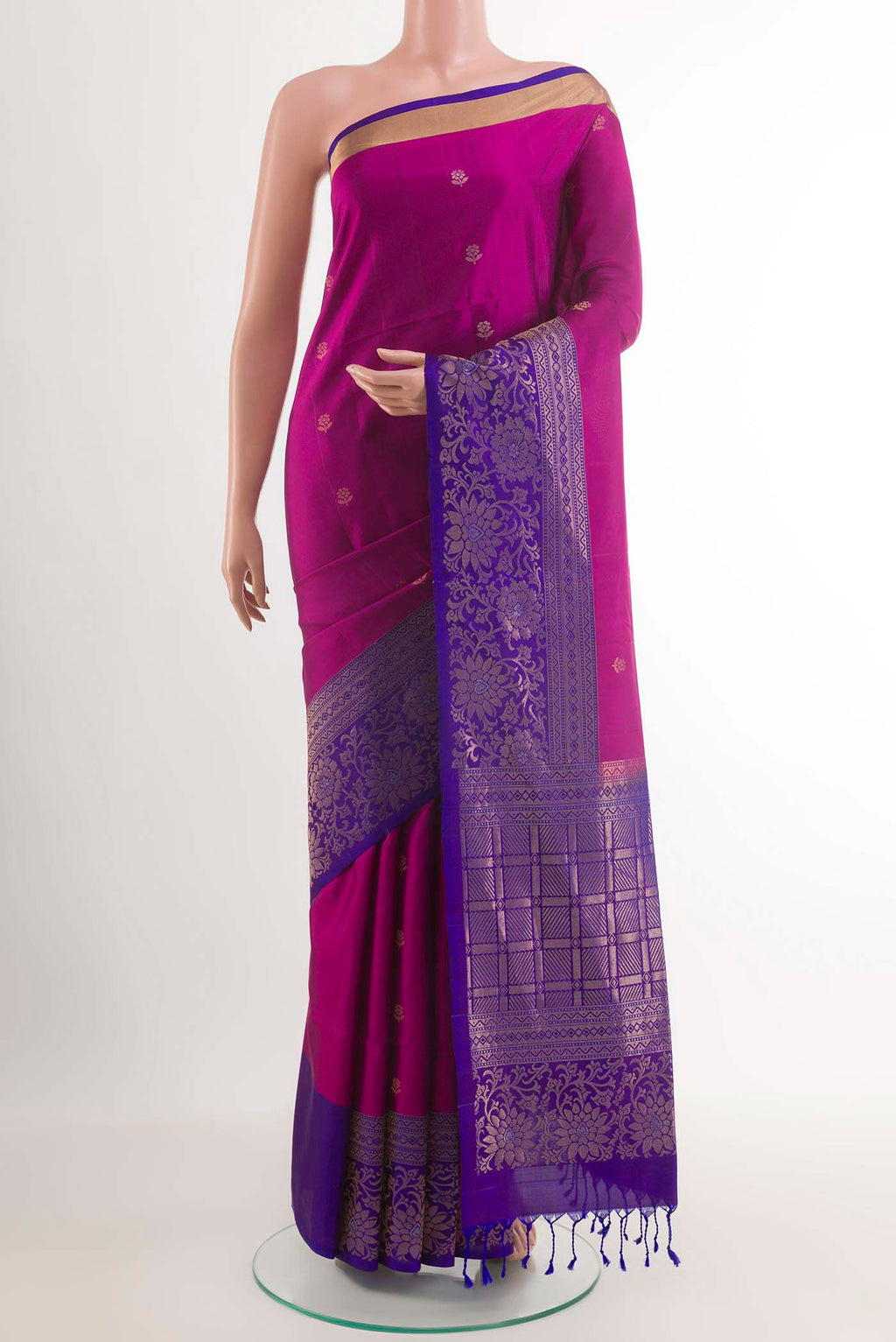 Purple Soft Silk Saree with Zari Butta on the body and Zari Border.  displayed on a mannequin