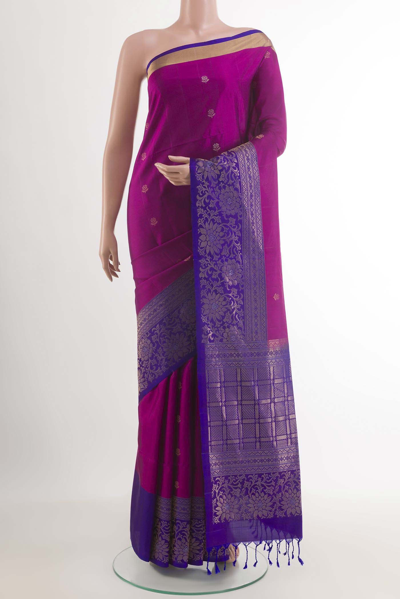 Purple Soft Silk Saree with Zari Butta on the body and Zari Border.  displayed on a mannequin