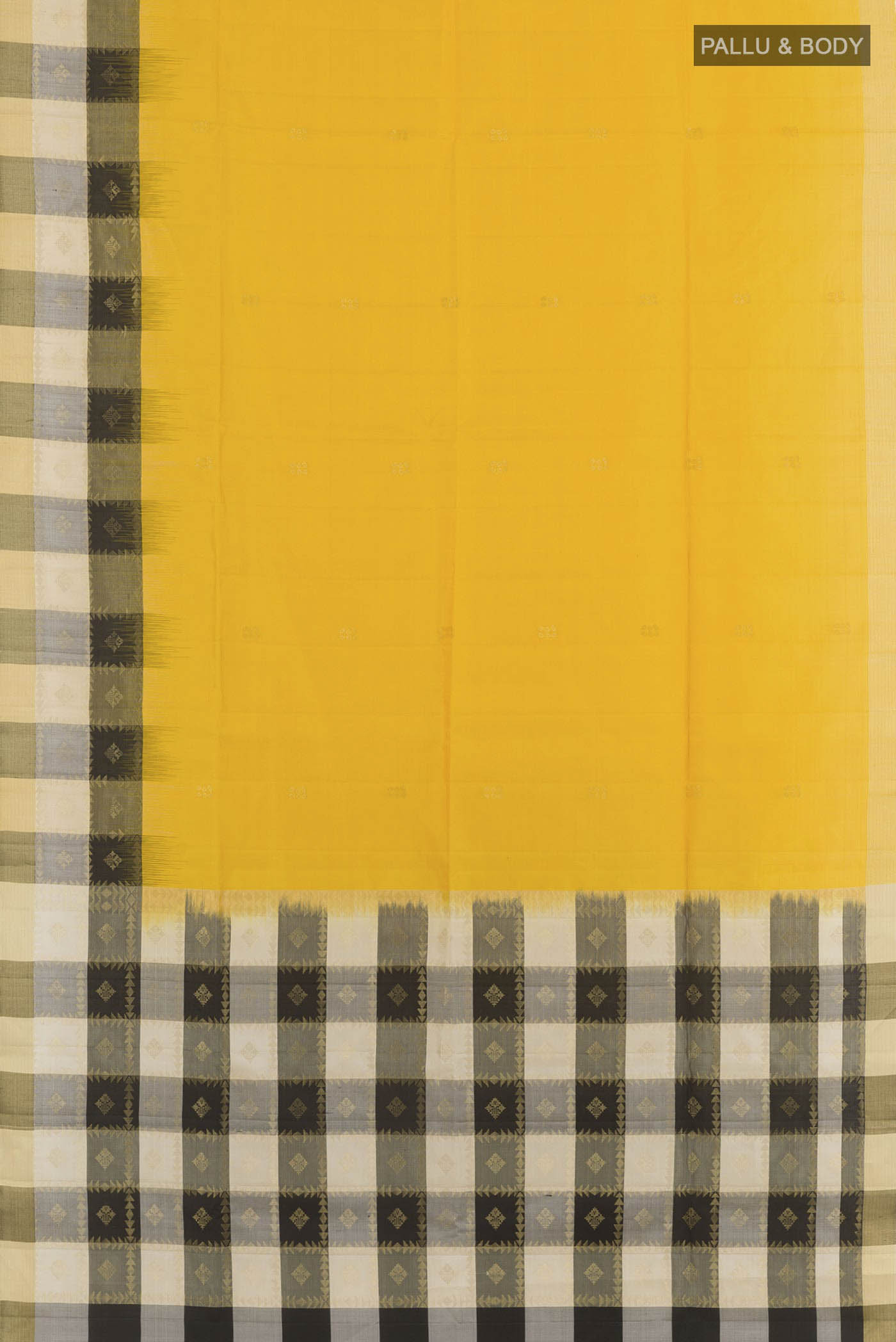 Flat view of Yellow Soft Silk Saree with Zari Butta on the body and Zari Border. 