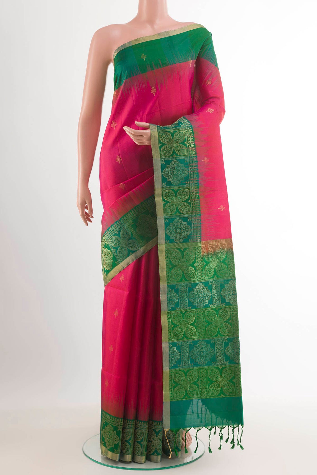 Pink Soft Silk Saree with Zari Butta on the body and Zari Border.  displayed on a mannequin