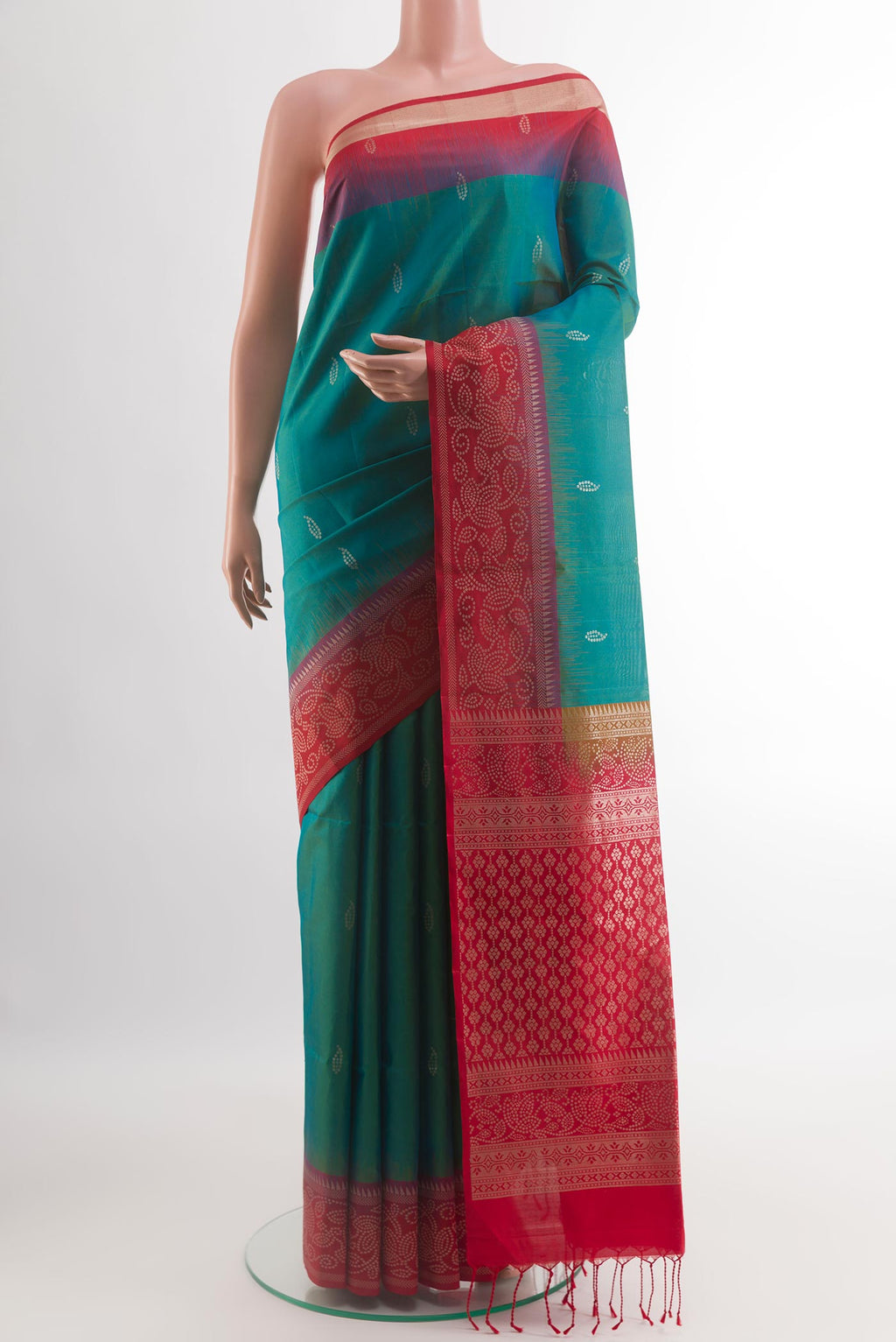 Blue Soft Silk Saree with Zari Butta on the body and Zari Border.  displayed on a mannequin